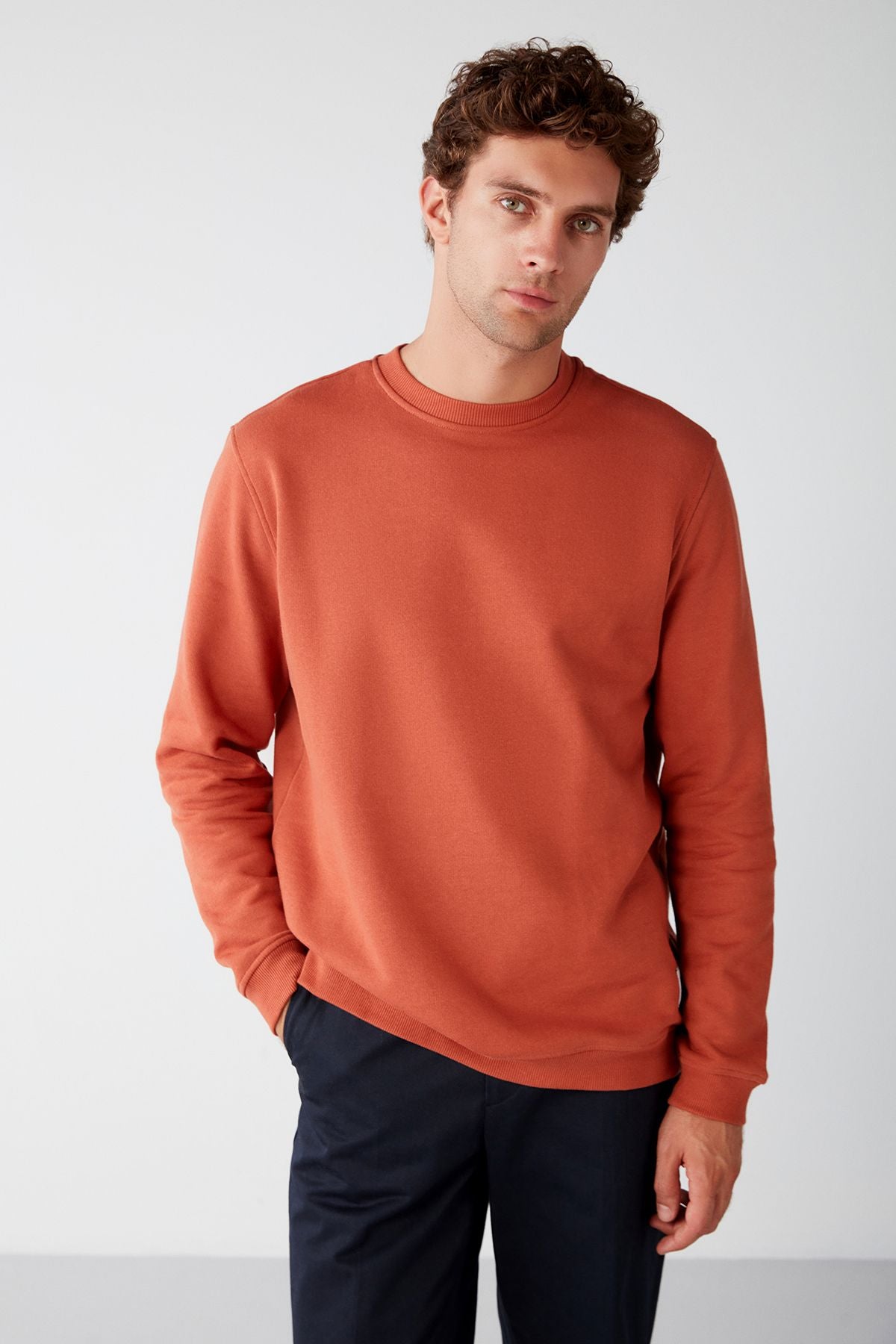 Travis Men's soft fabric regular fit round collar orange sweatshirt