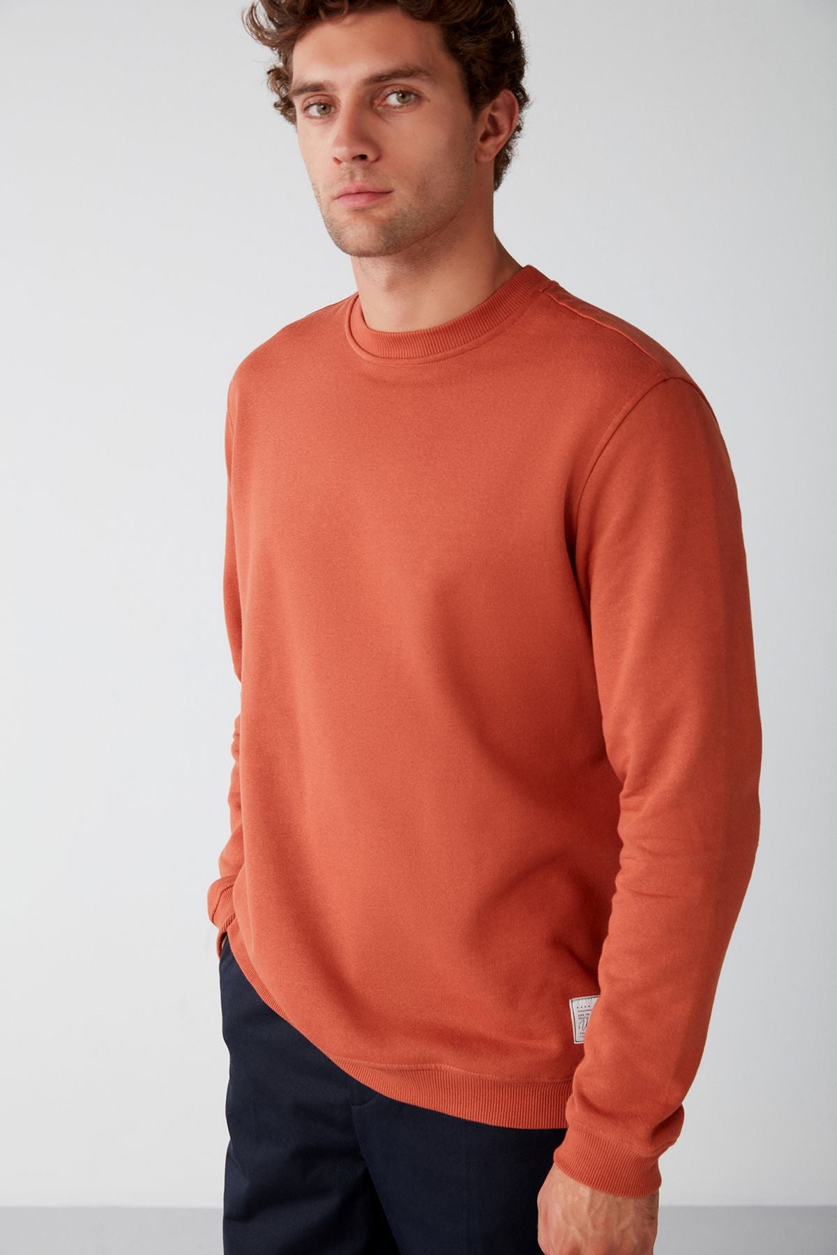 Travis Men's soft fabric regular fit round collar orange sweatshirt