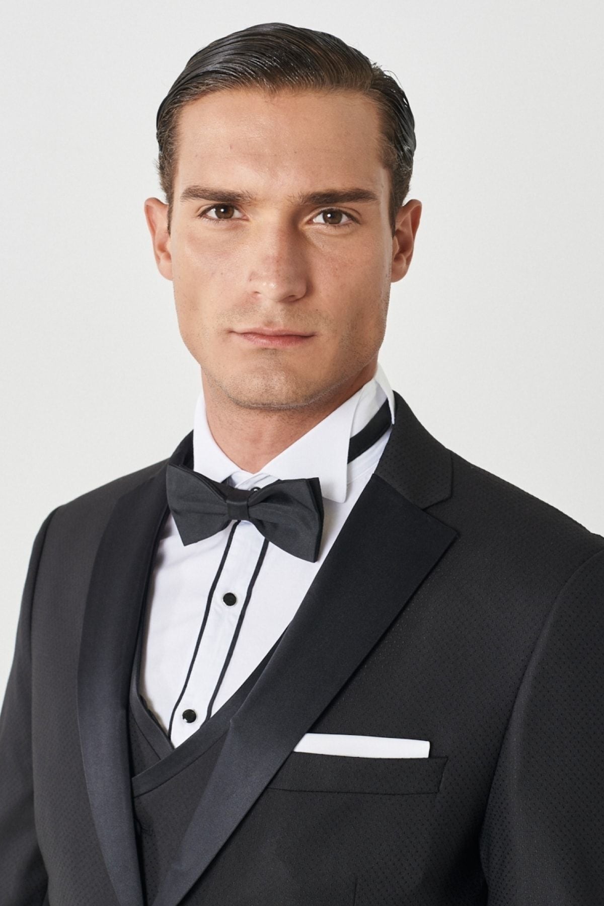 Men's black slim fit narrow cutting tuxedo with mono collar patterned vest