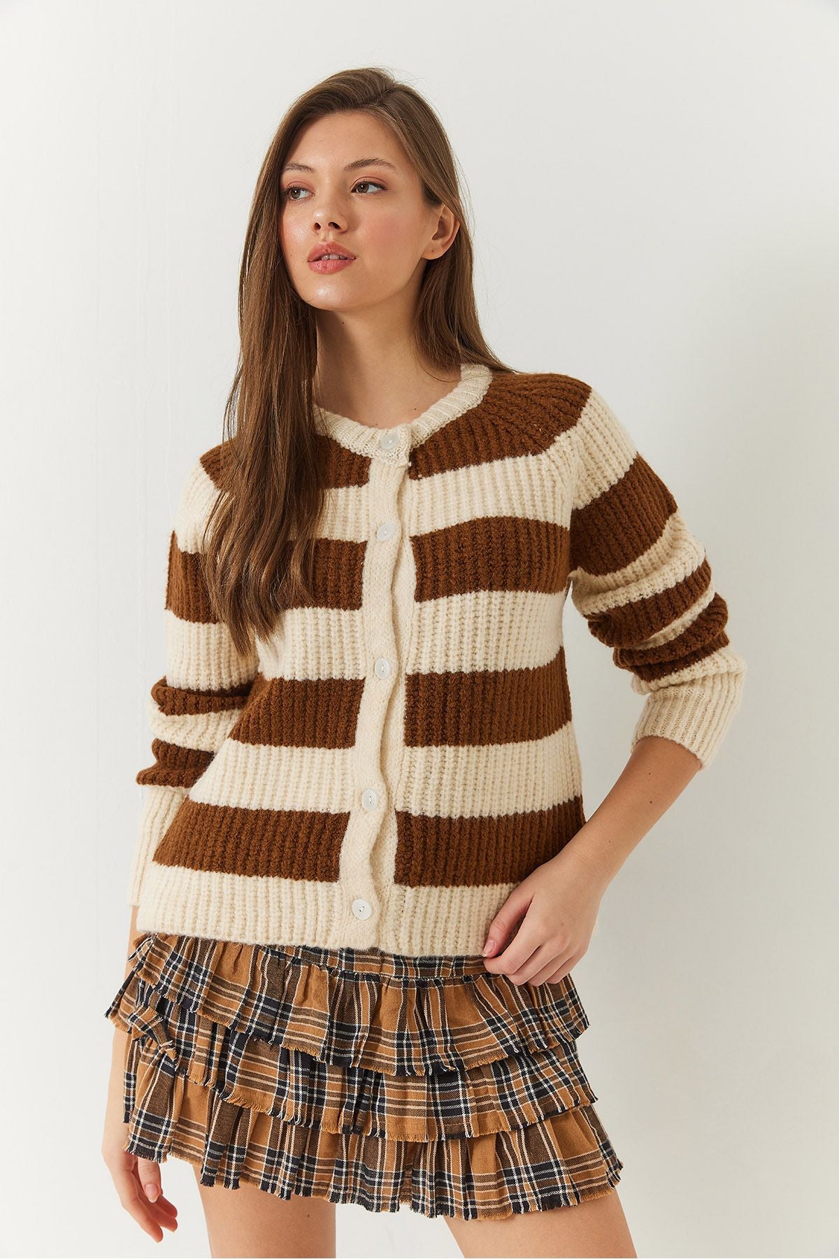 Female striped buttoned knitwear cardigan