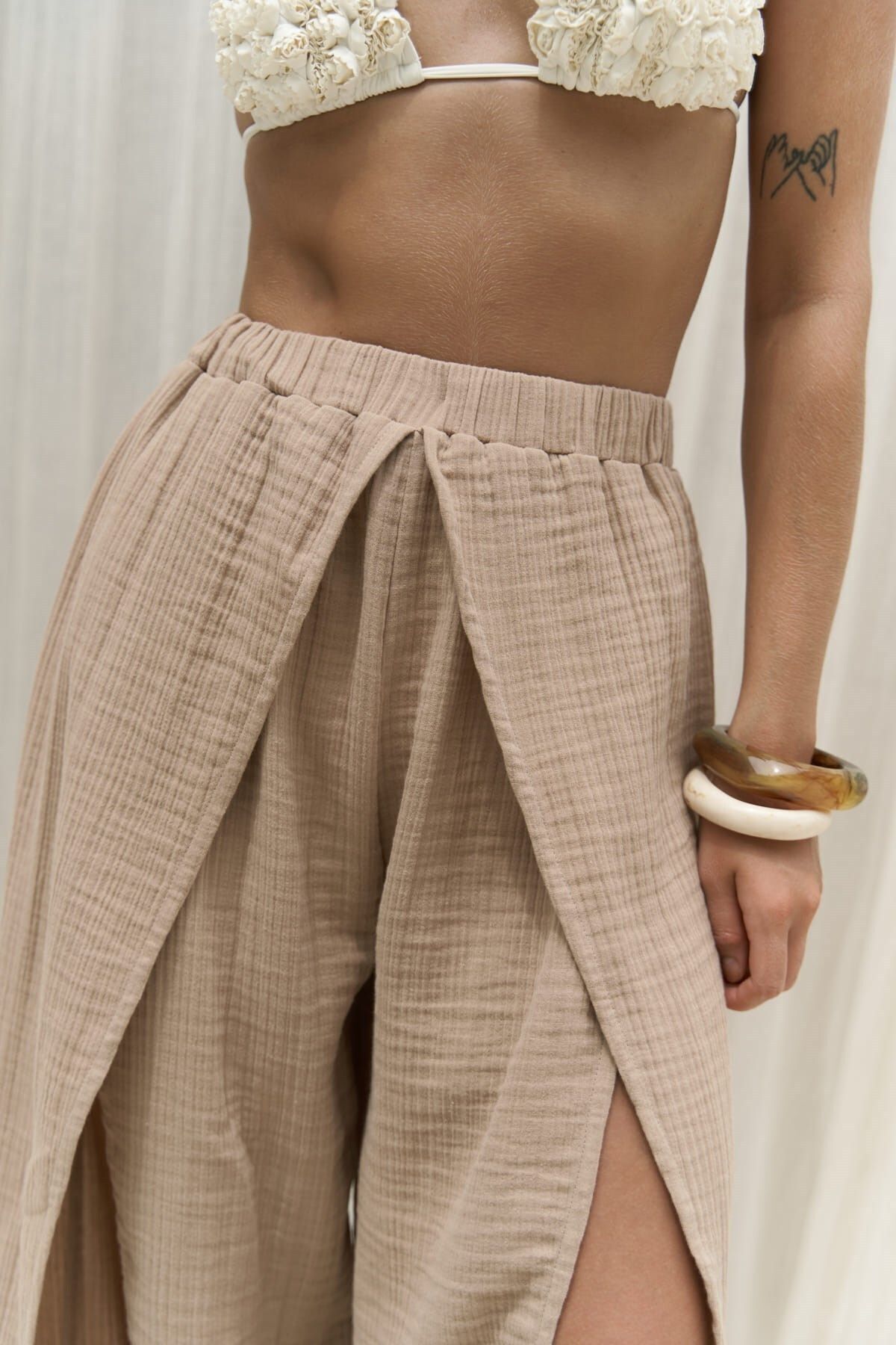 Bima slit detailed mink trousers