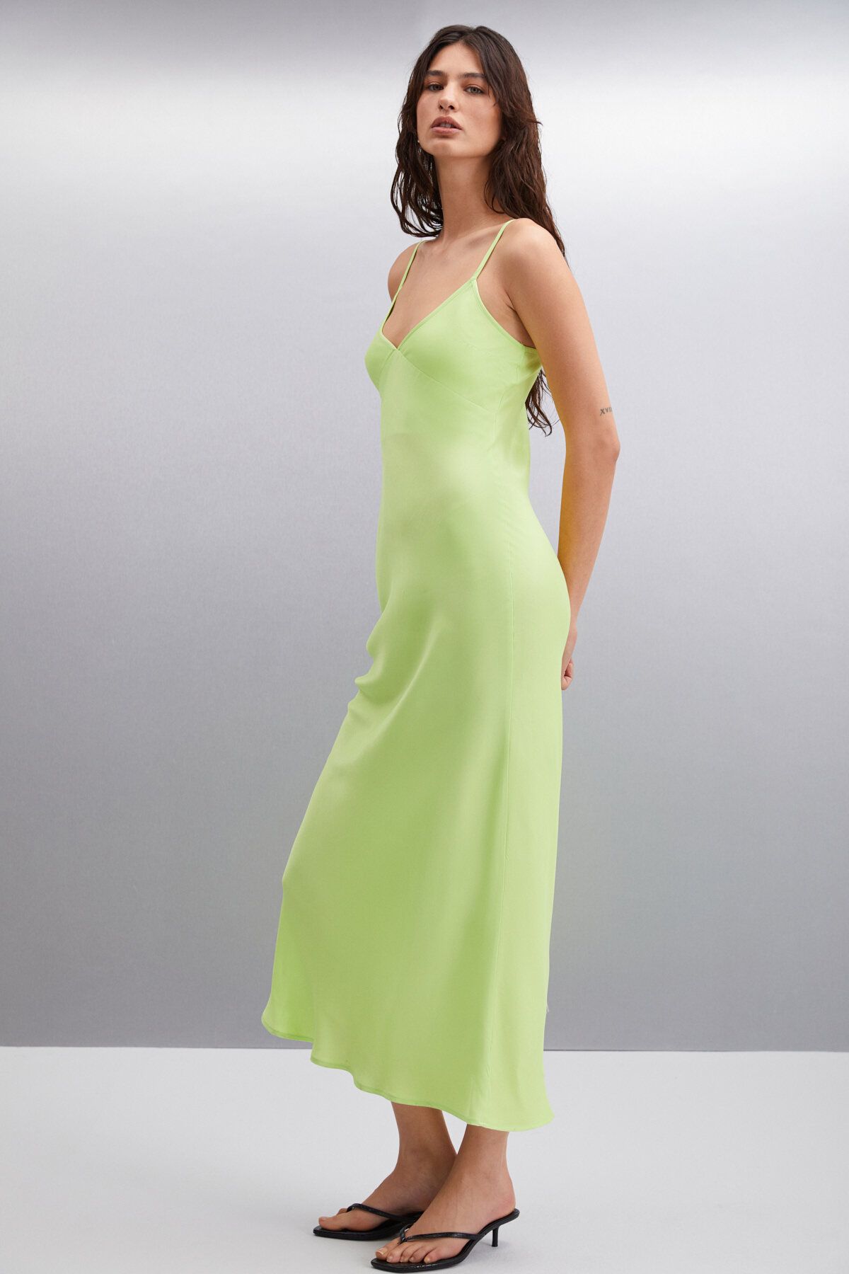 Nashaly woman thick woven satin strap with maxi light green dress expanding from the waist