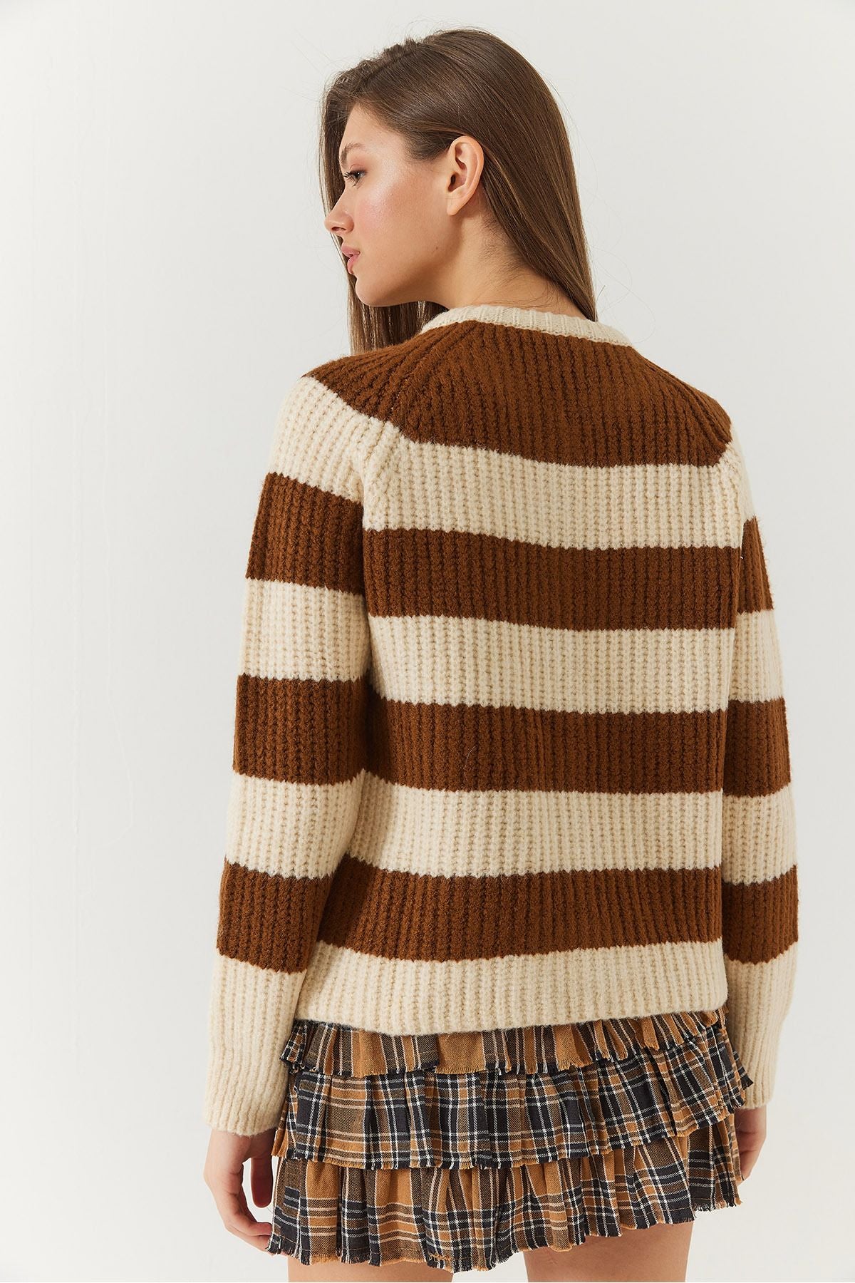 Female striped buttoned knitwear cardigan