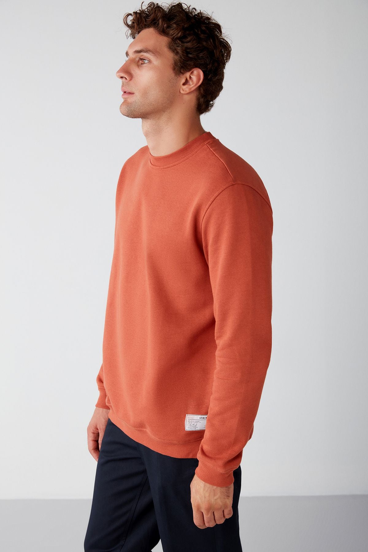 Travis Men's soft fabric regular fit round collar orange sweatshirt