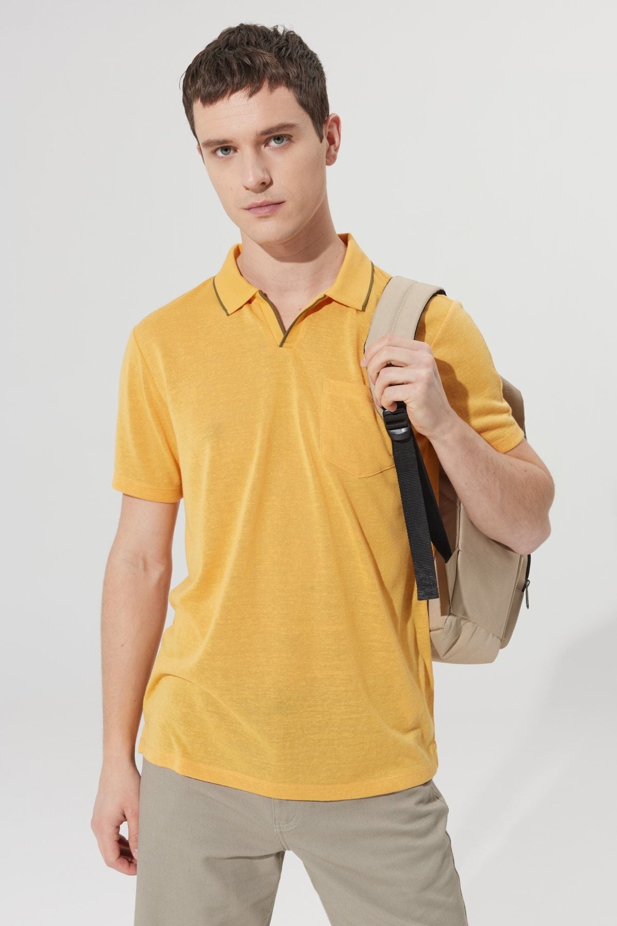 Men's yellow slim fit narrow cut polo collar pocket short sleeve linen -looking T -shirt