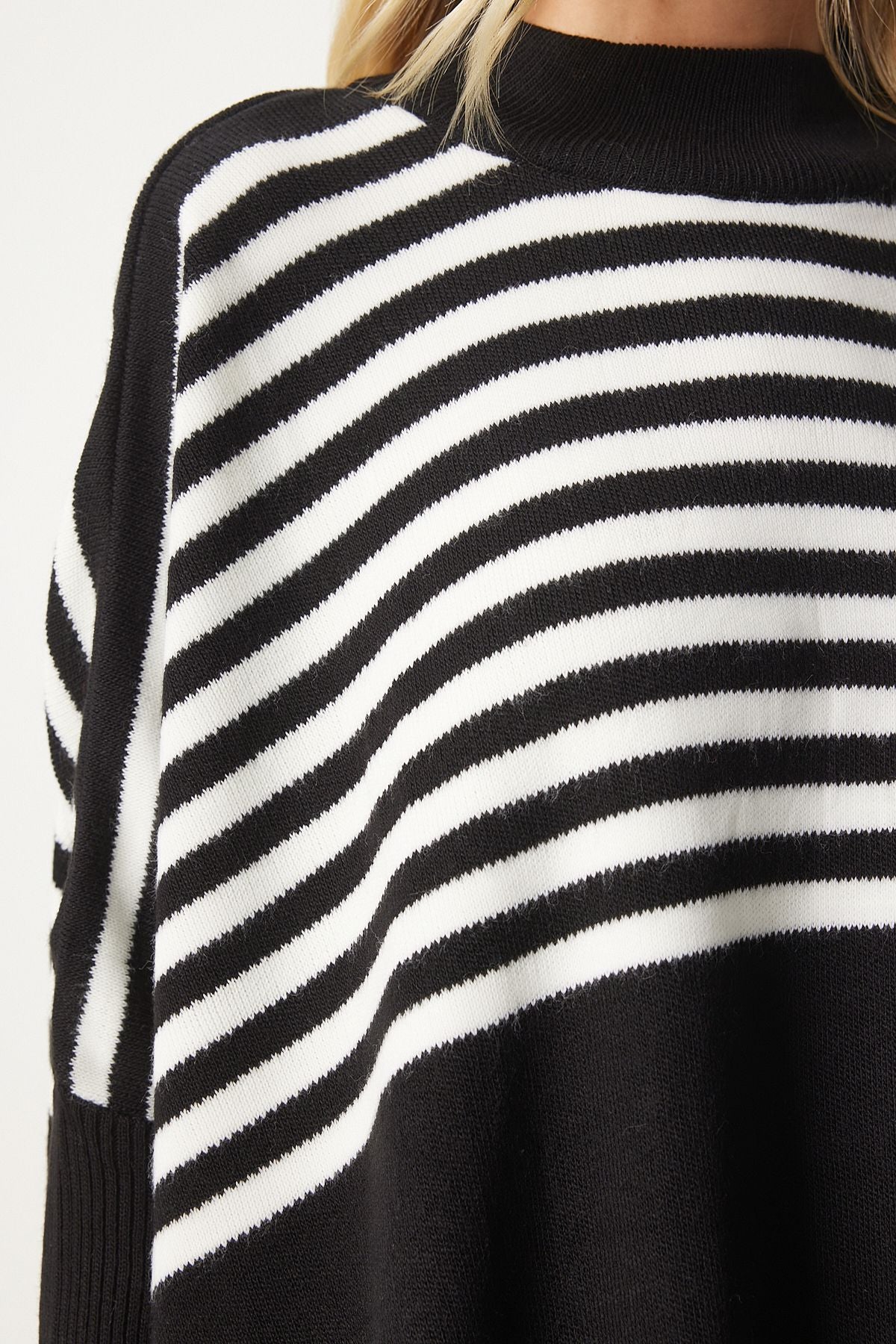 Women's black striped side slit overlawing poncho sweater DD01336