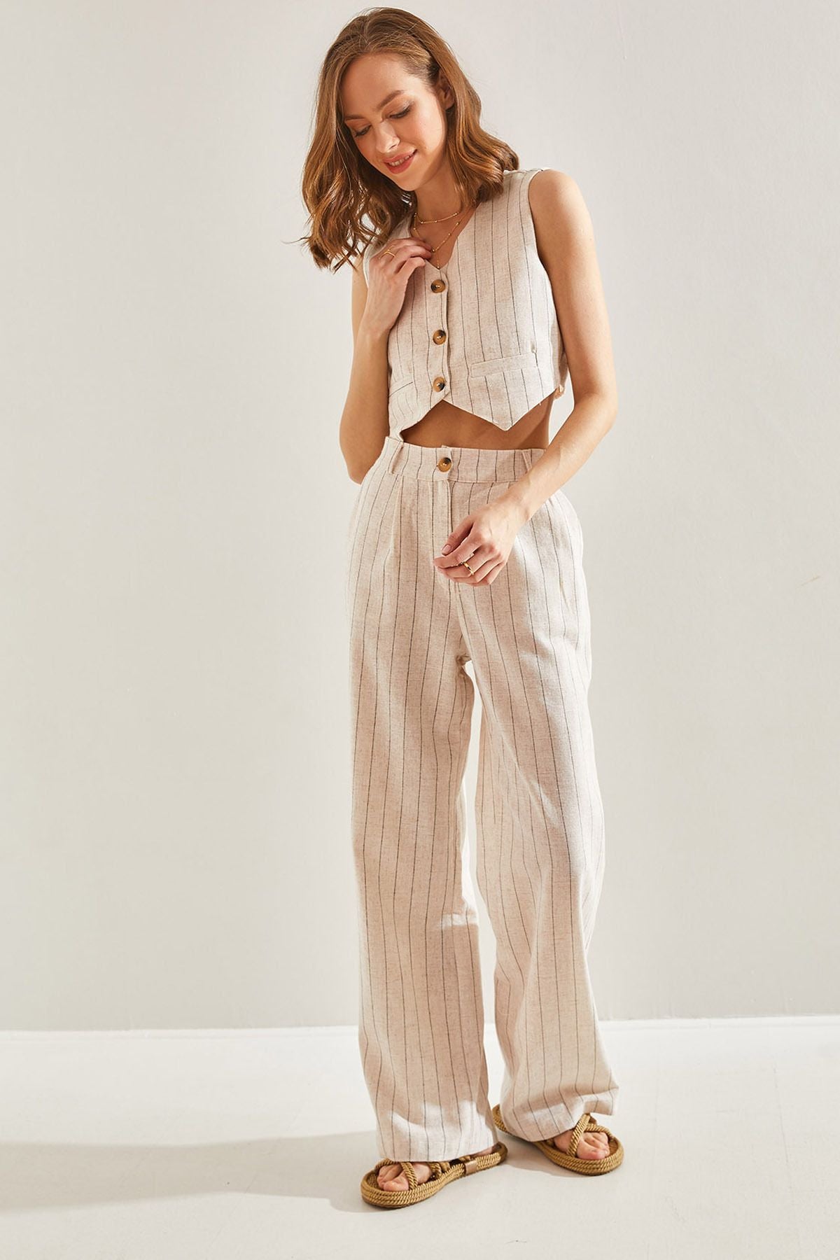 Blower with a woman striped vest