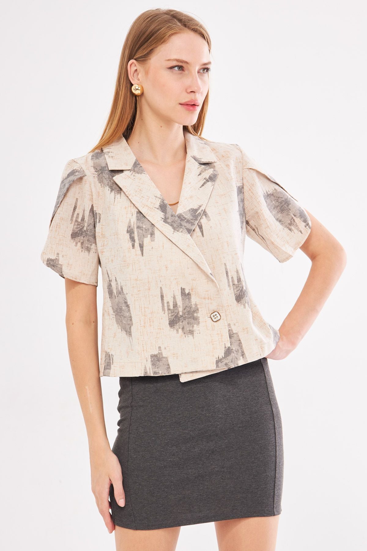 Female smoked linen looking patterned arm slit and short sleeve jacket ARM-24Y001095