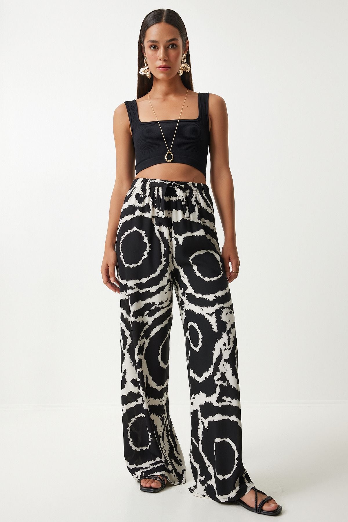 Female black light cream pattern draped viscose palazzo pants EN00606