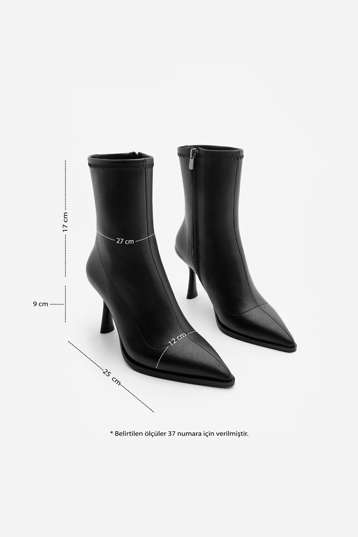 Woman heeled boots pointed nose glass