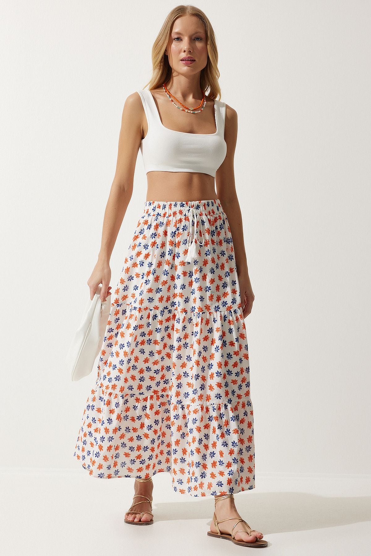 Female ecru oranj floral patterned flywheel