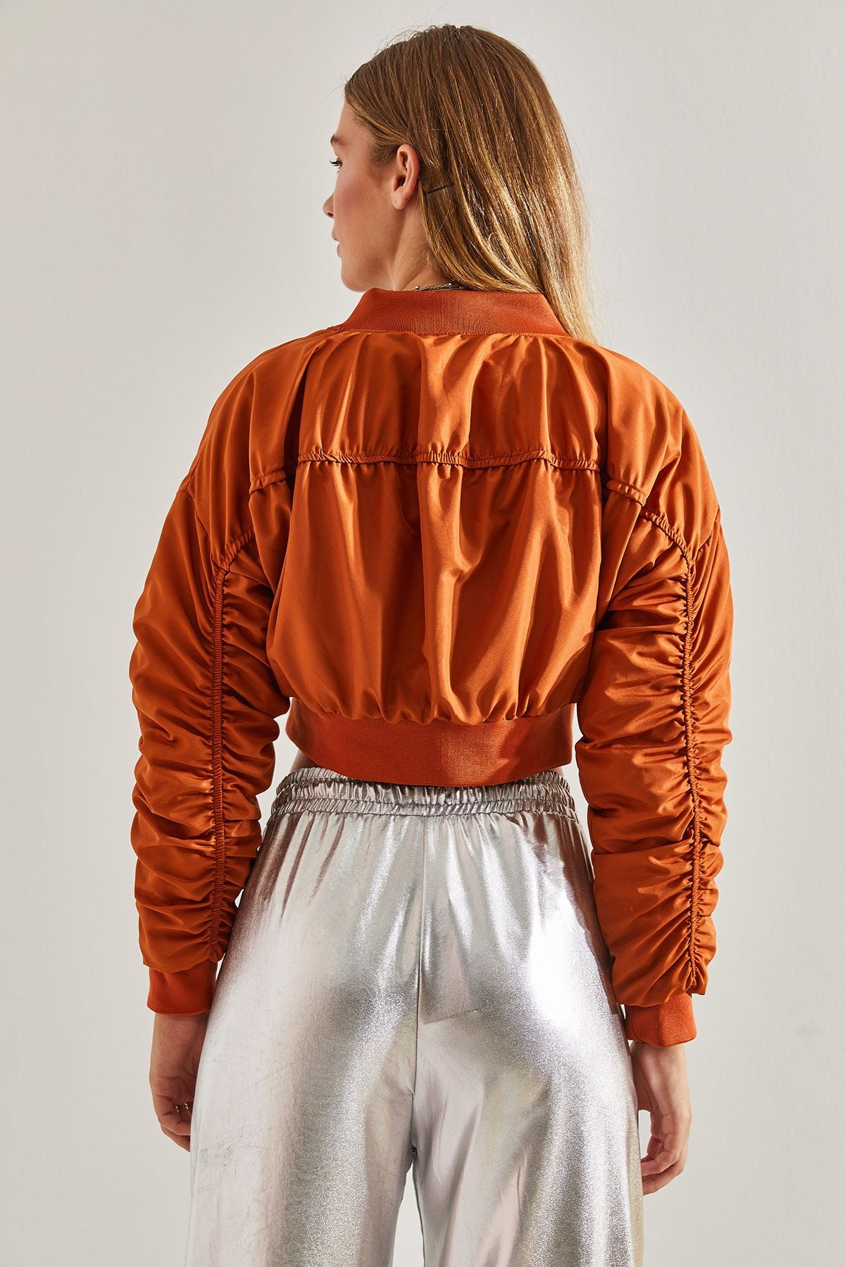 Female arm shirred bomber jacket
