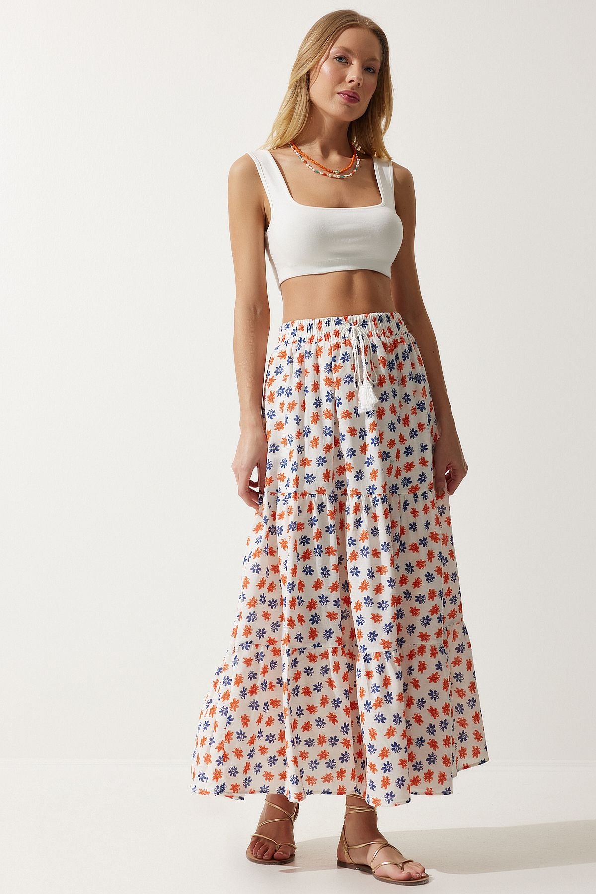 Female ecru oranj floral patterned flywheel