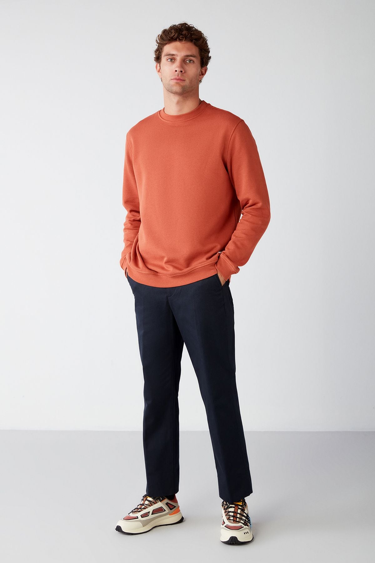 Travis Men's soft fabric regular fit round collar orange sweatshirt