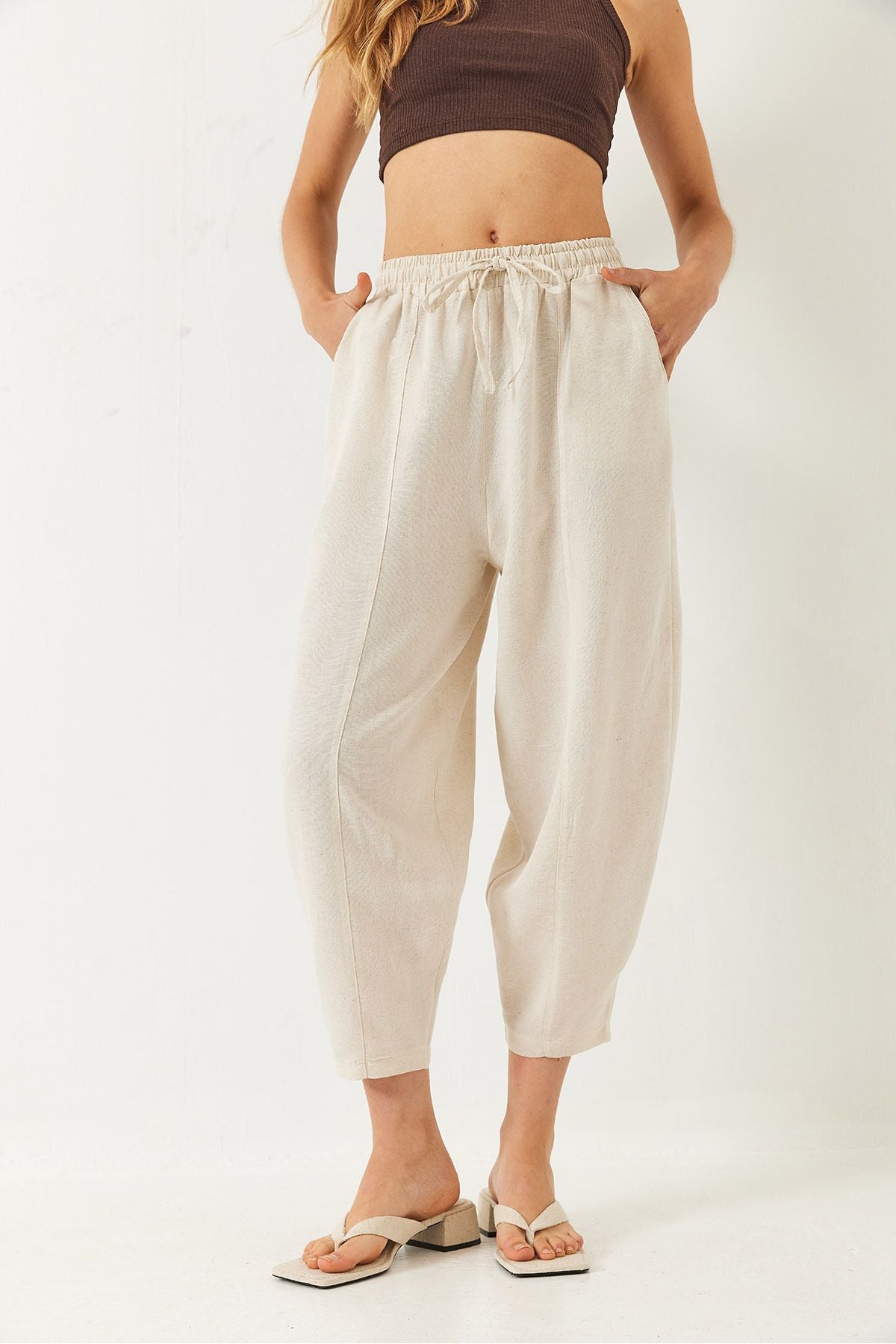 Women's waist elapsed pocket detailed shalwar cut pants 60261456