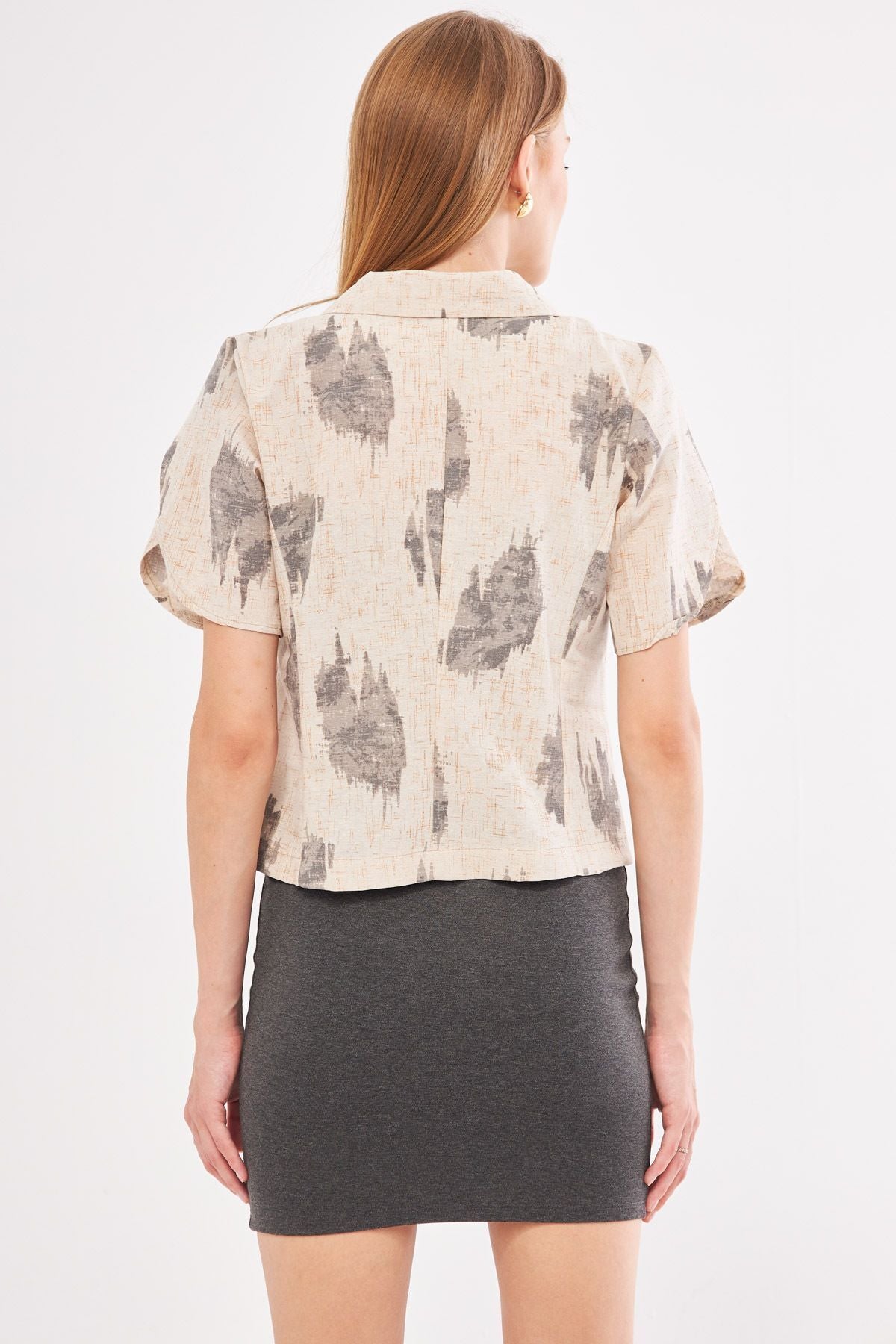 Female smoked linen looking patterned arm slit and short sleeve jacket ARM-24Y001095