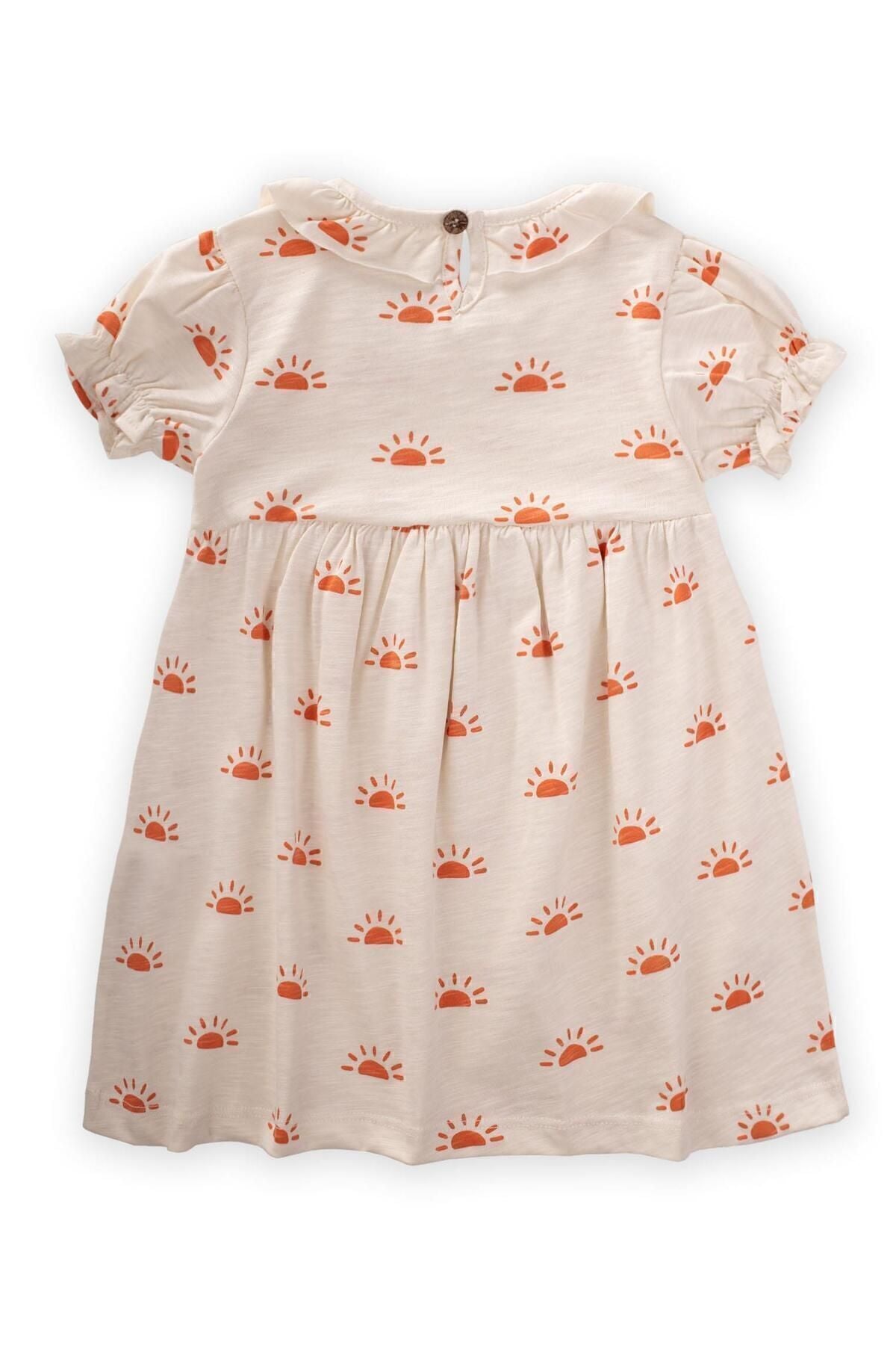 Patterned dress 1-6 age ecru sun pattern