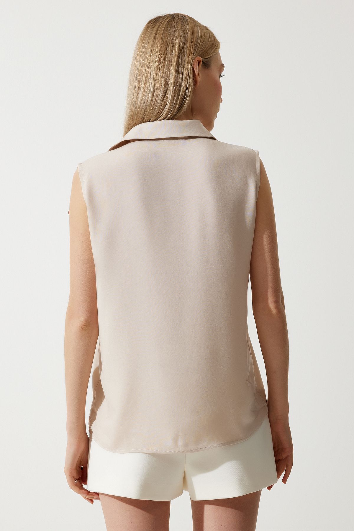 Women's Cream Sleeveless viscose shirt to00129