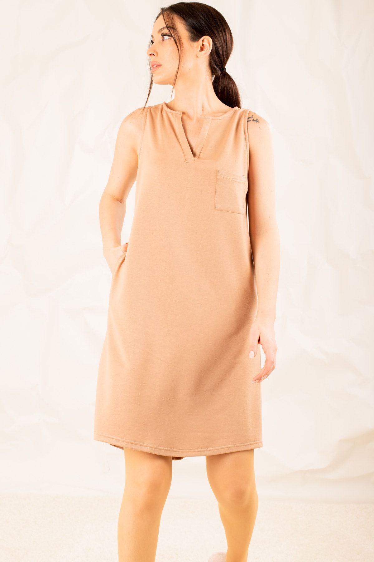Female beige pocket midi size dress arm-19y001122