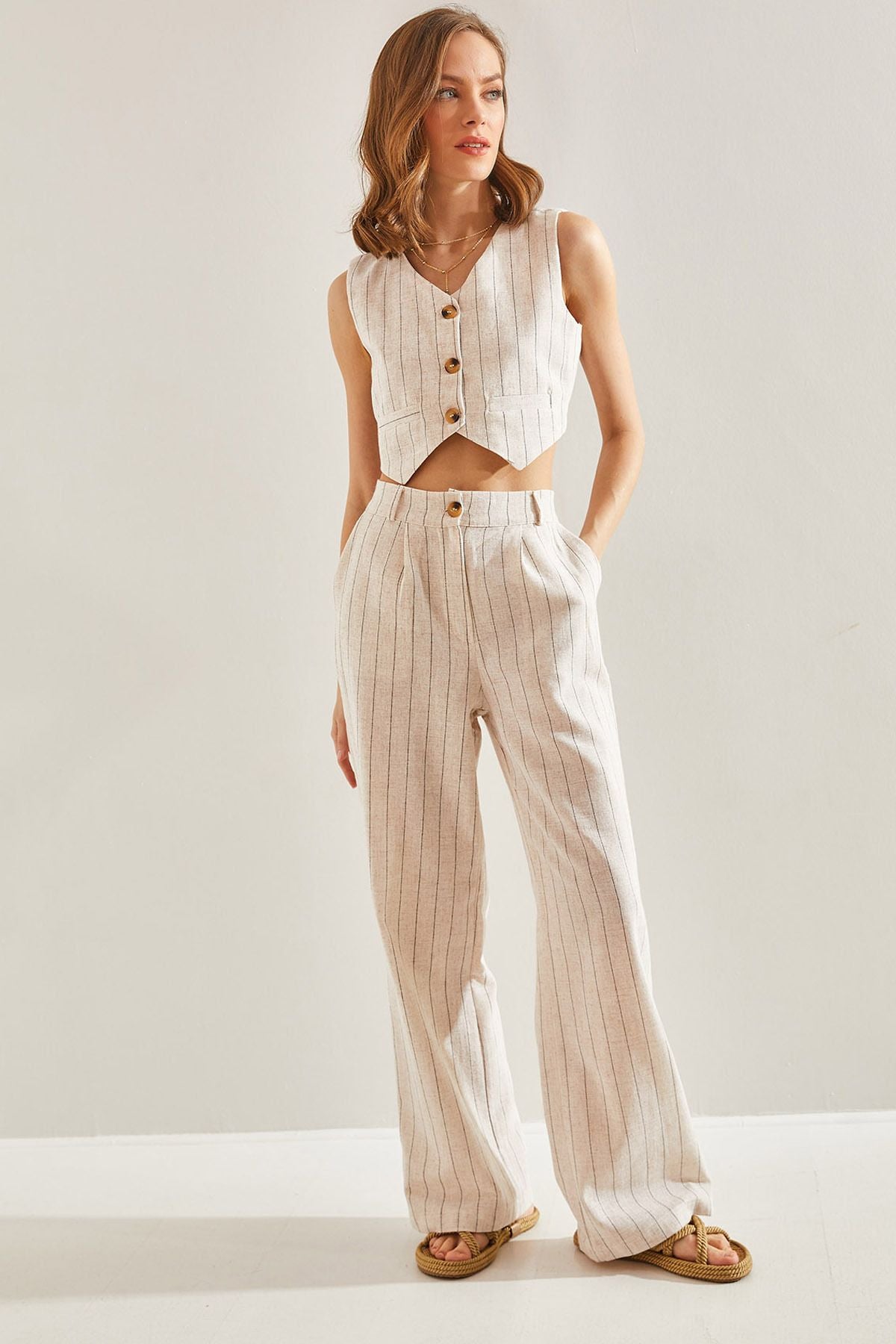 Blower with a woman striped vest