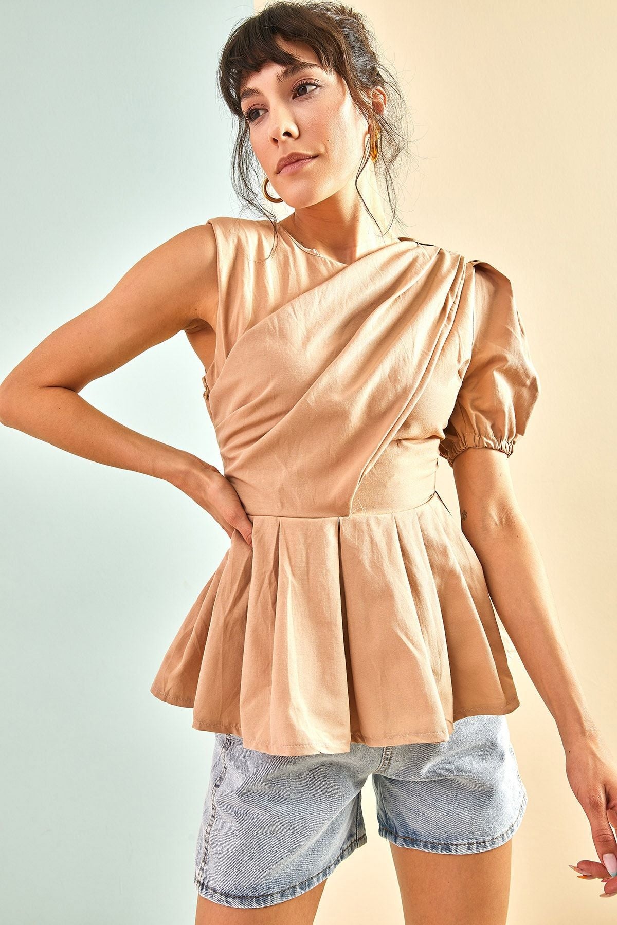 Woman one shoulder waist frilly blouse