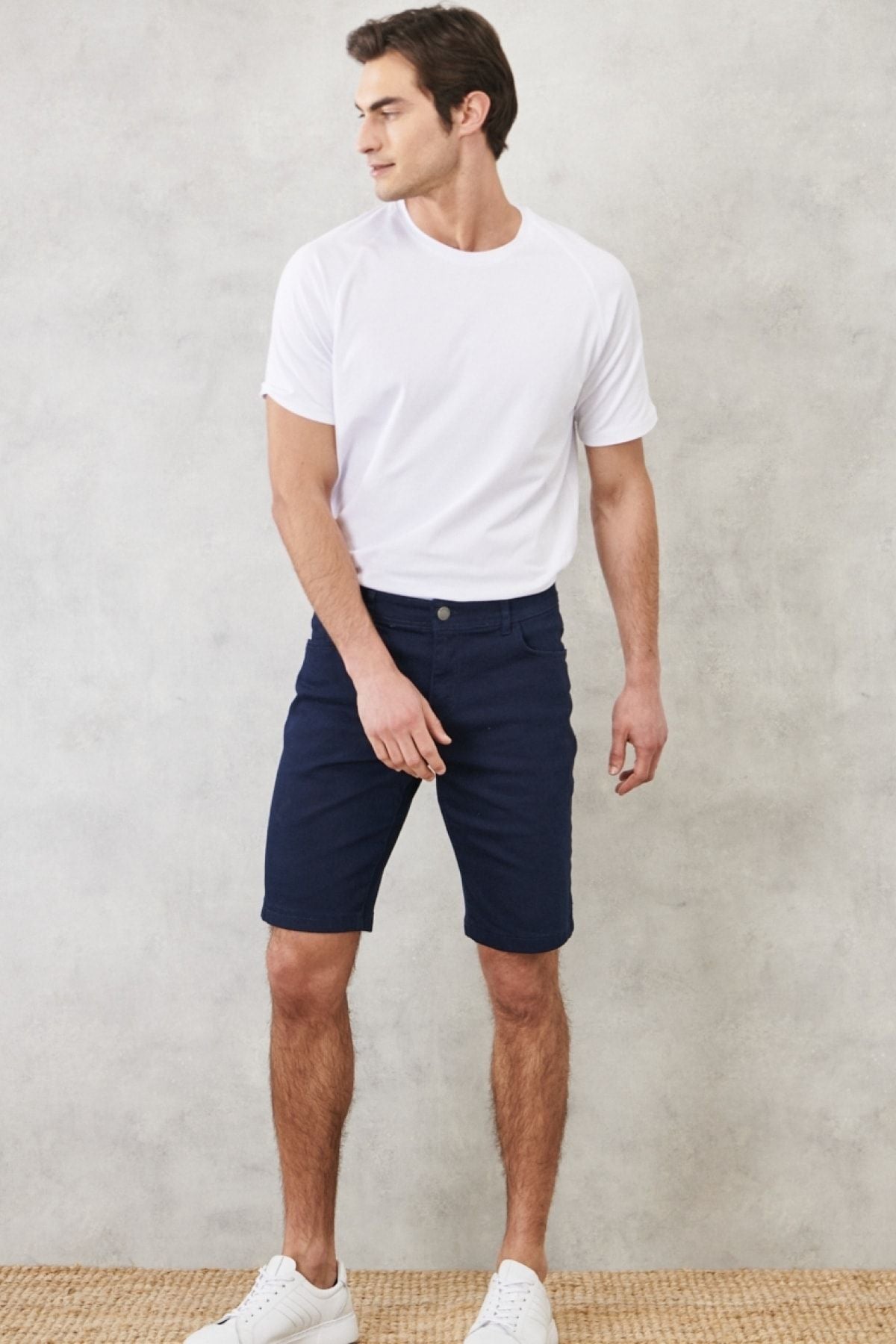 Men's navy blue slim fit narrow cut diagonal pattern 5 pocket flexible shorts