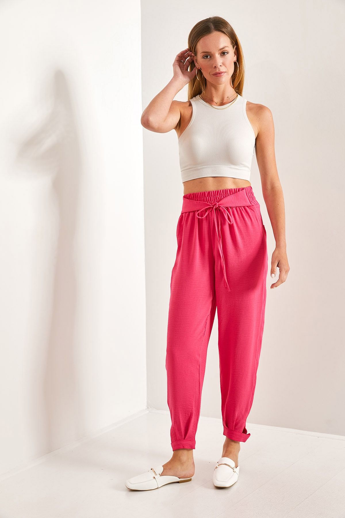 Women's waist rubber tota button detailed belt pants