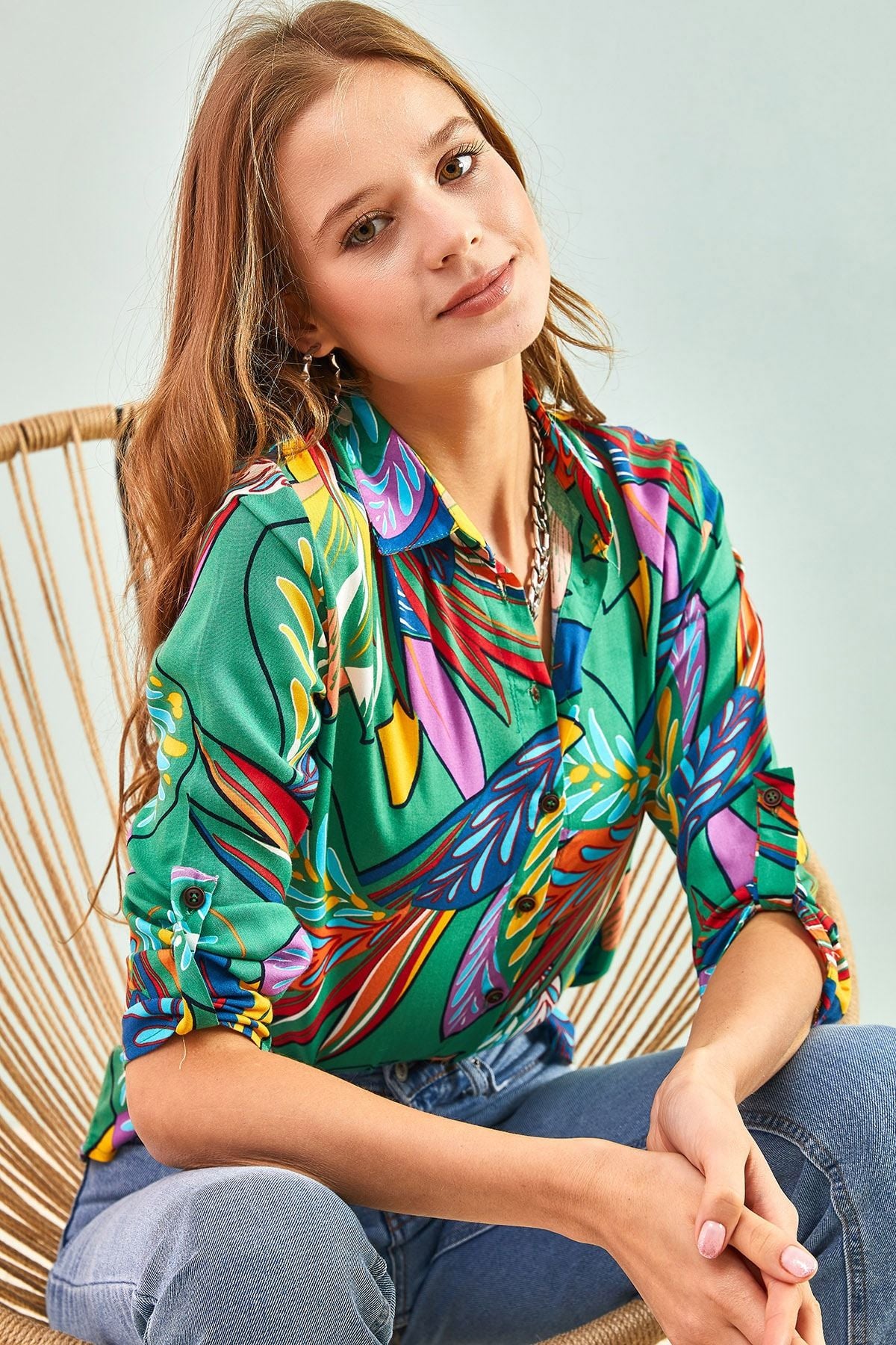 Female multi leaf patterned arm folding viscose shirt