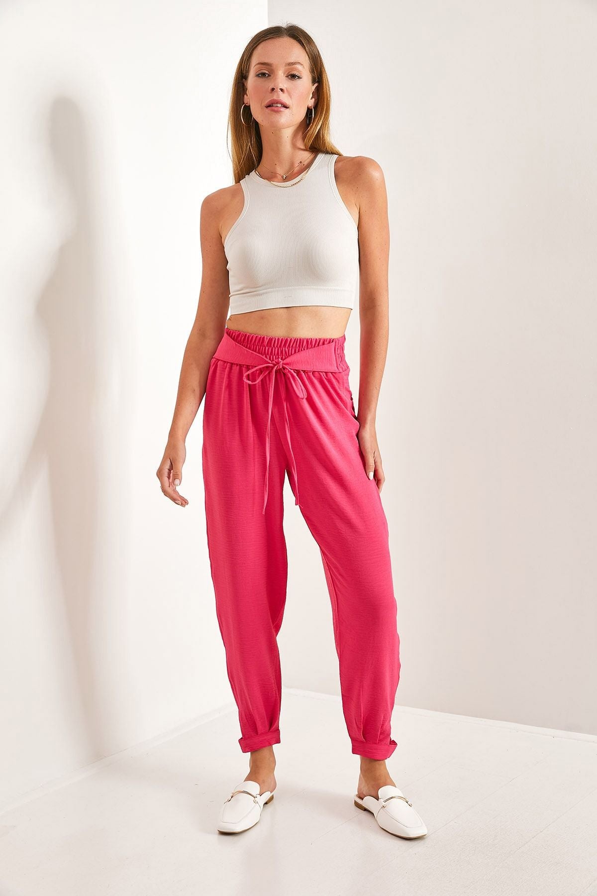 Women's waist rubber tota button detailed belt pants
