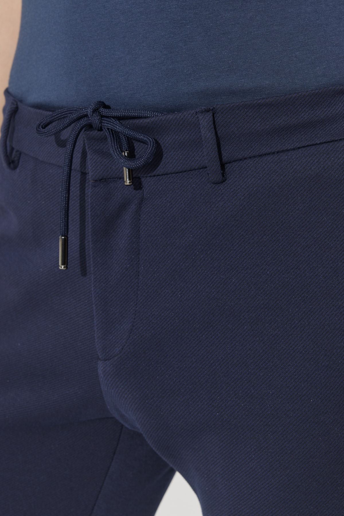 Men's navy blue slim fit narrow cut diagonal patterned flexible waist tied jogger pants