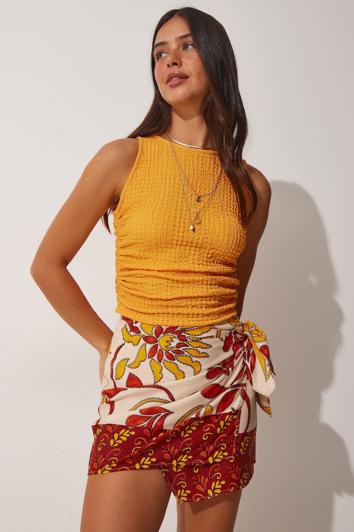 Female tile beige patterned mini viscose skirt FN03063