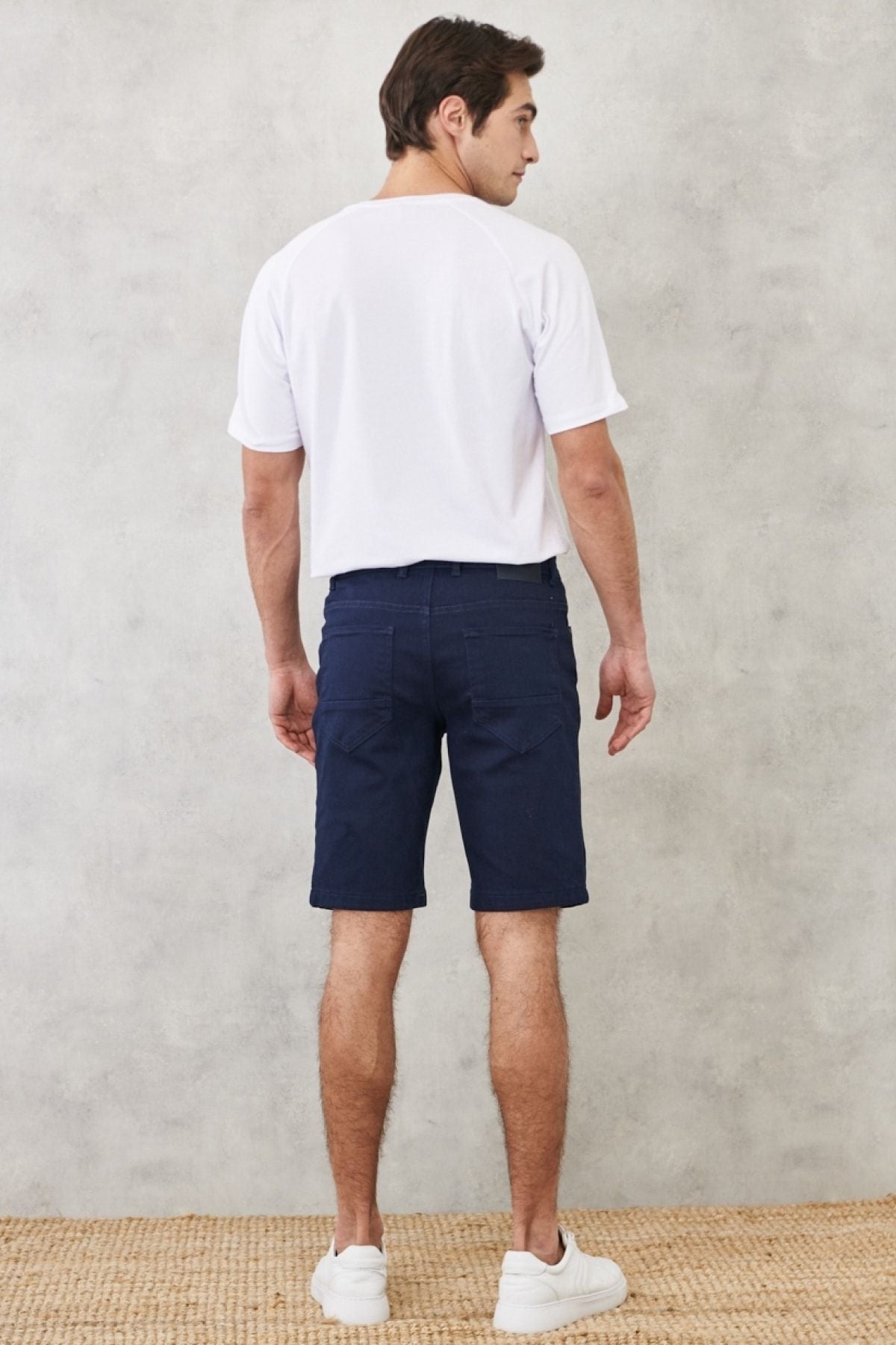 Men's navy blue slim fit narrow cut diagonal pattern 5 pocket flexible shorts