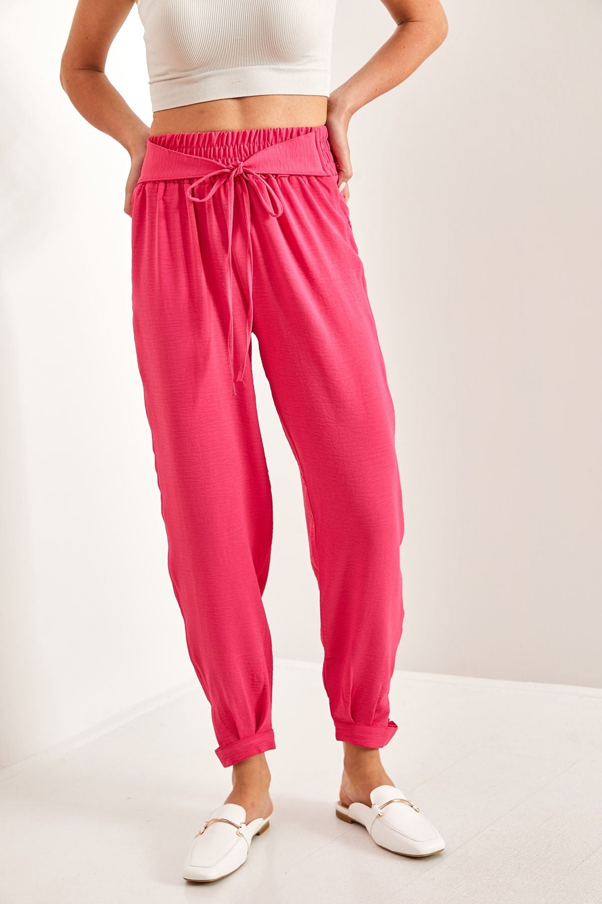 Women's waist rubber tota button detailed belt pants