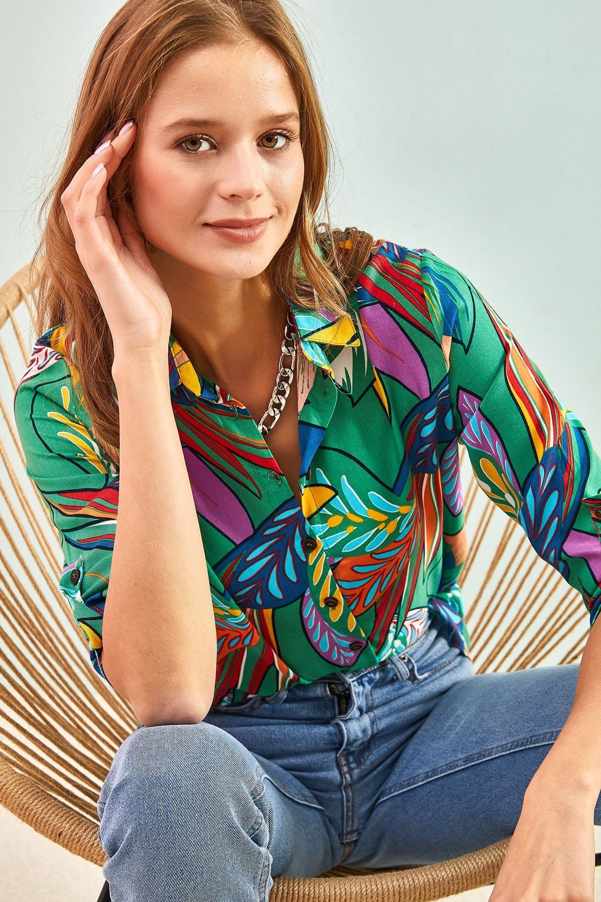 Female multi leaf patterned arm folding viscose shirt