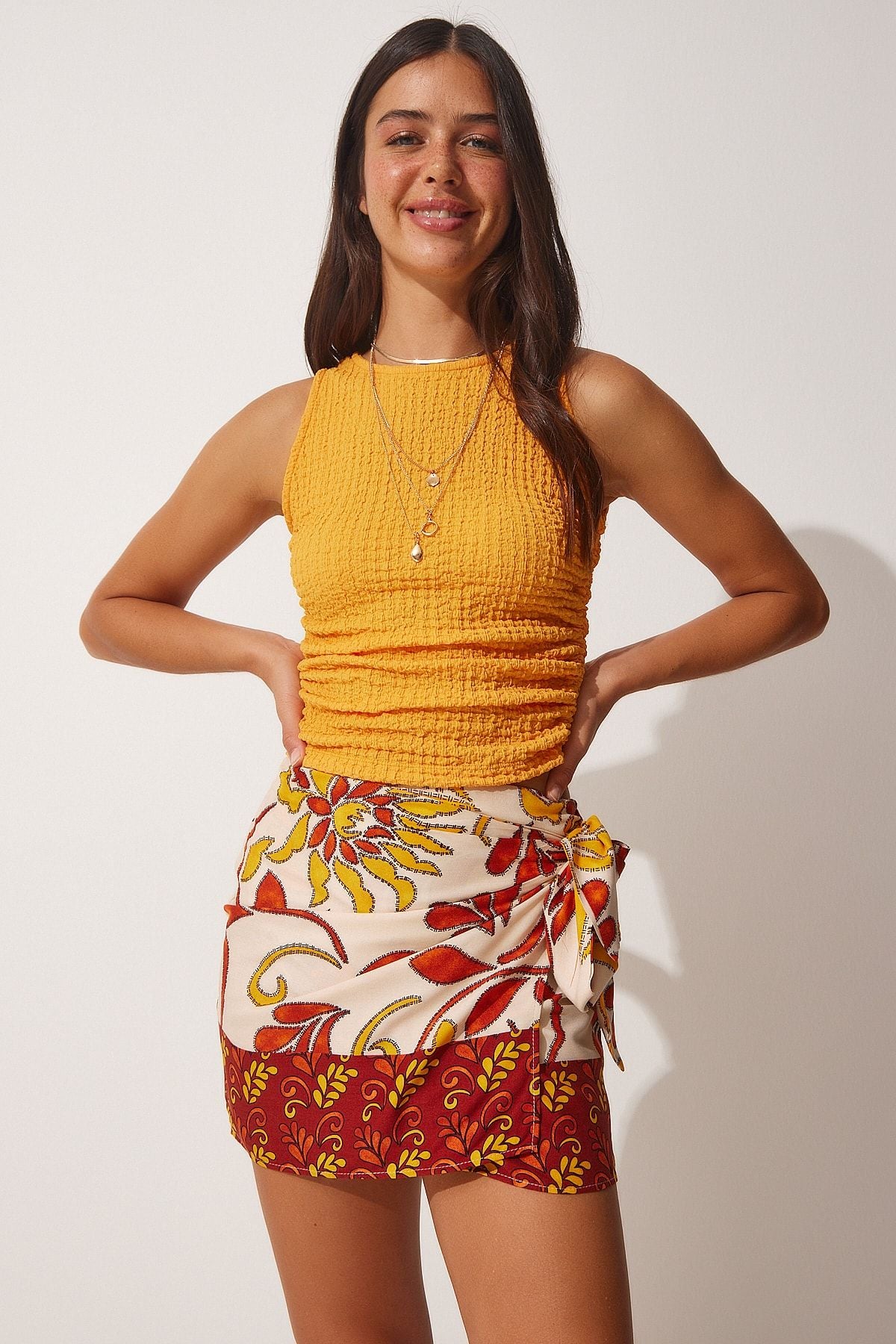 Female tile beige patterned mini viscose skirt FN03063
