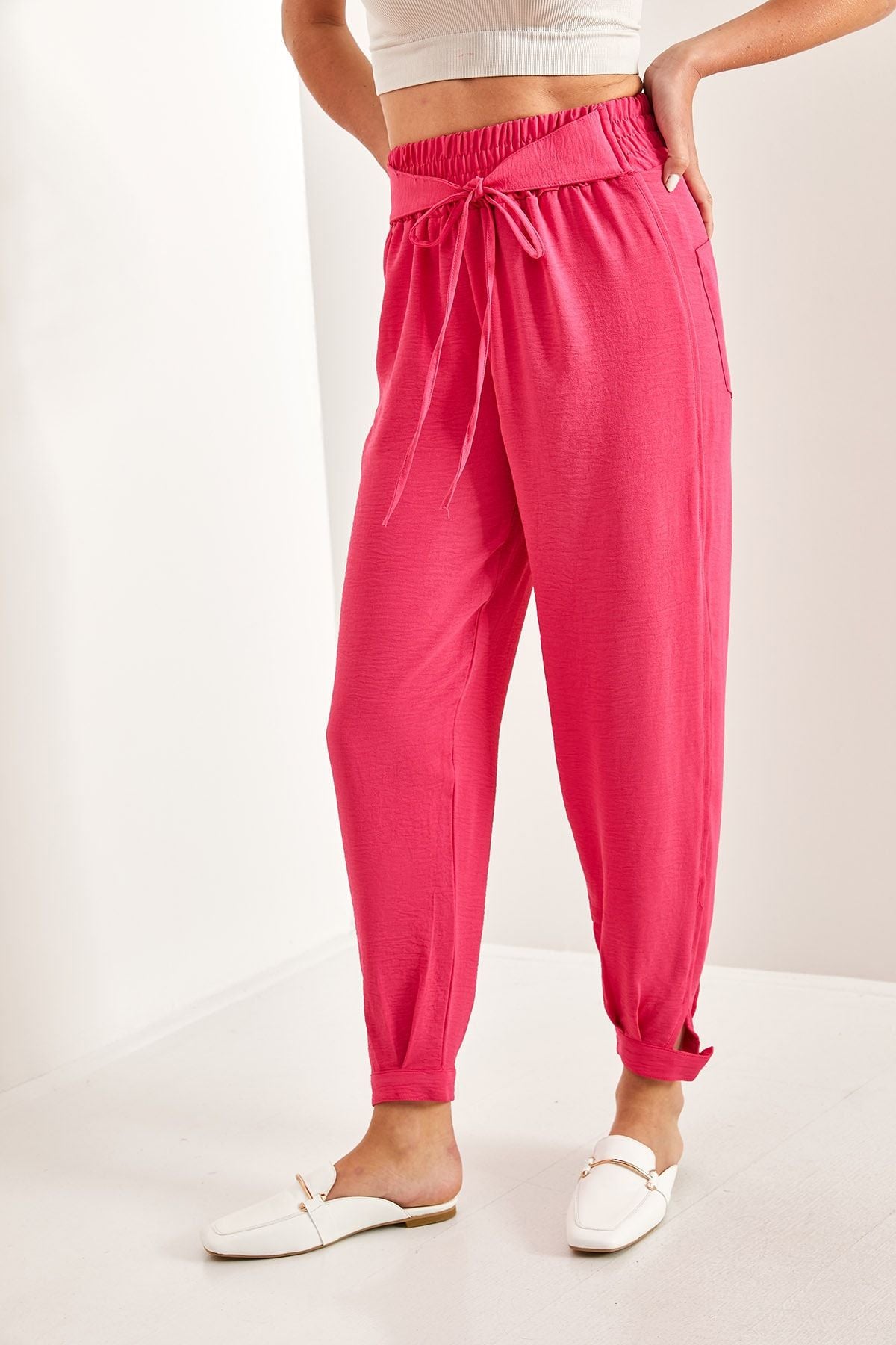 Women's waist rubber tota button detailed belt pants