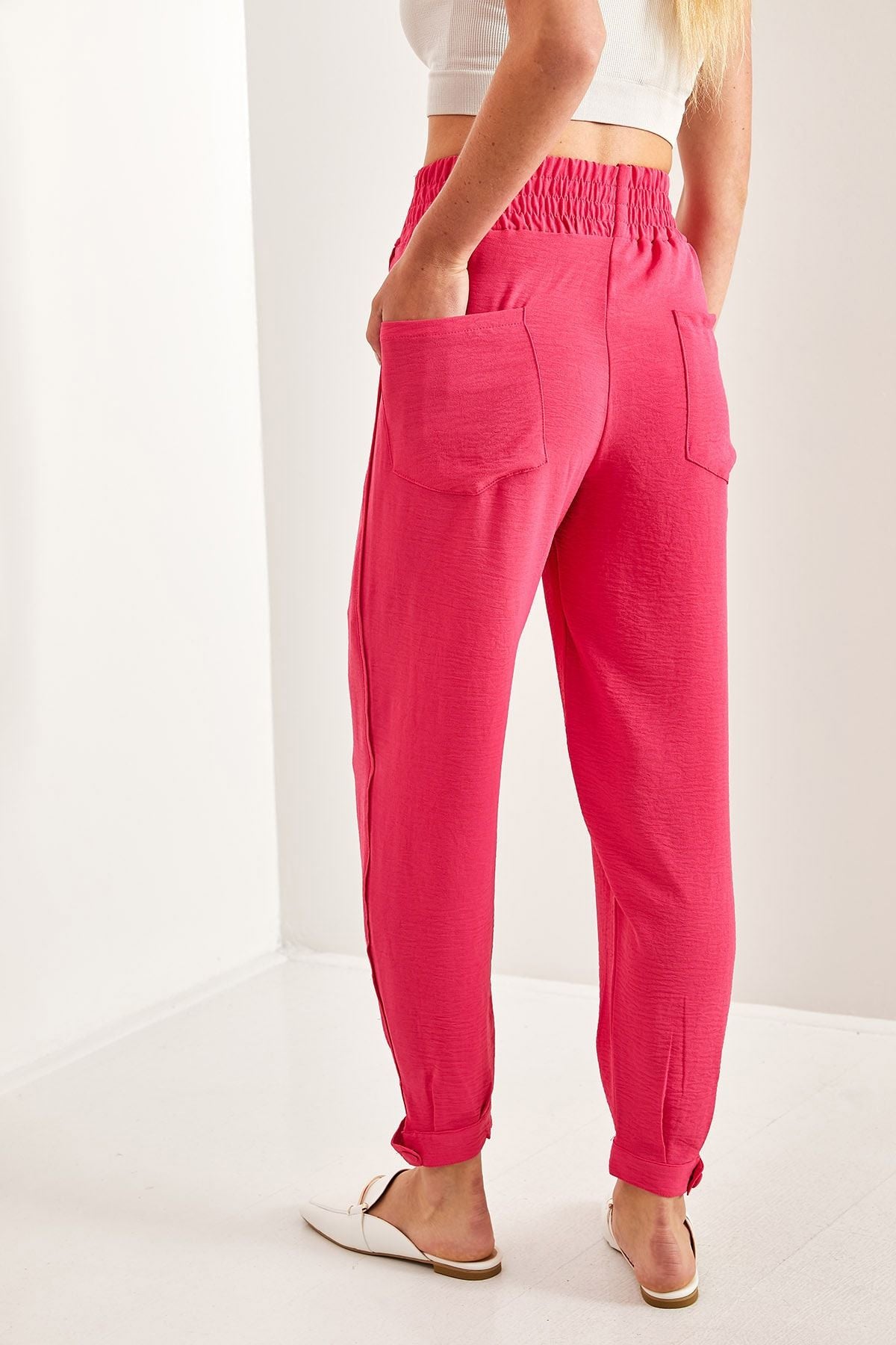 Women's waist rubber tota button detailed belt pants