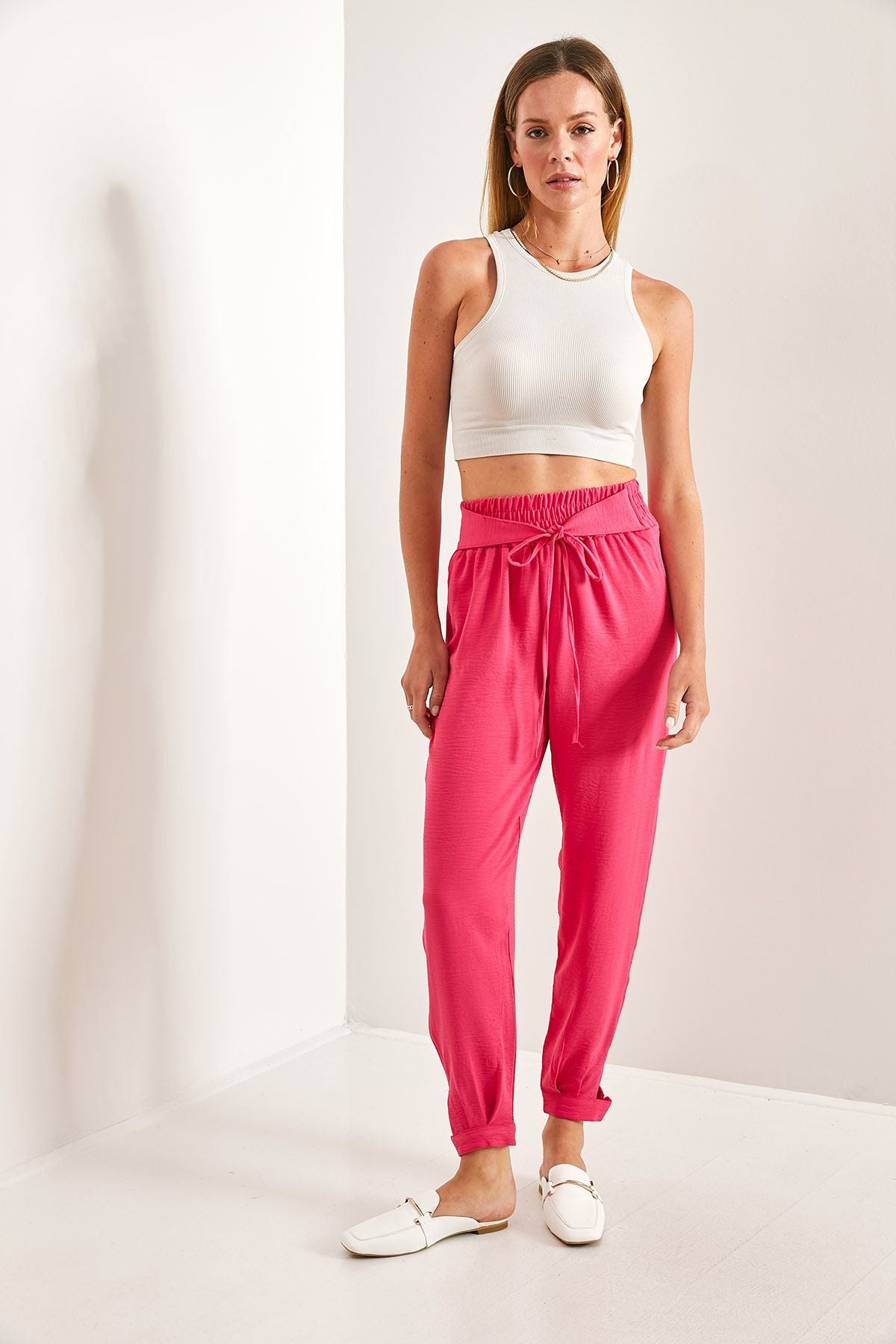 Women's waist rubber tota button detailed belt pants