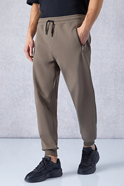 PEPO Men's Relaxed Dark Brown Sweatpants with Elastic Waist Pockets and Zipper Print Detail