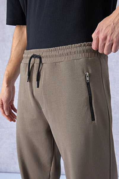 PEPO Men's Relaxed Dark Brown Sweatpants with Elastic Waist Pockets and Zipper Print Detail